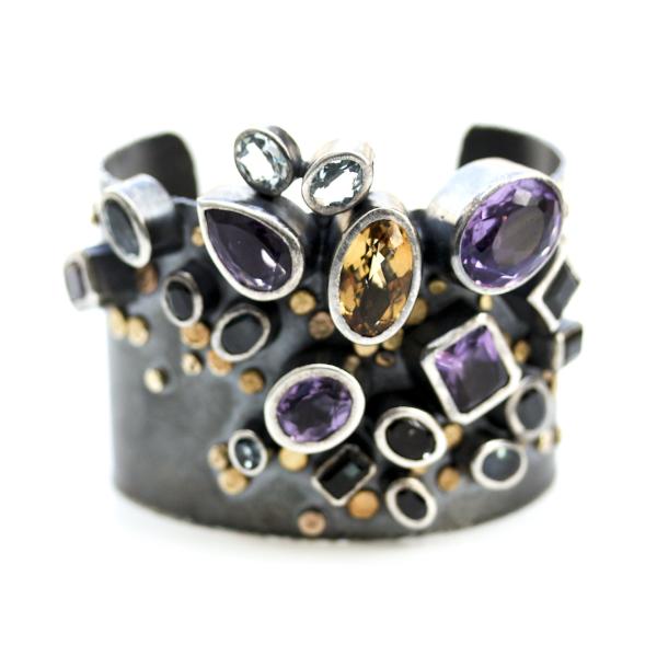 Handmade one of a kind bangle in oxidized sterling silver with Amethyst, Citrine, Topaz, Tourmaline, and Sapphire with 18K Gold dots, detail